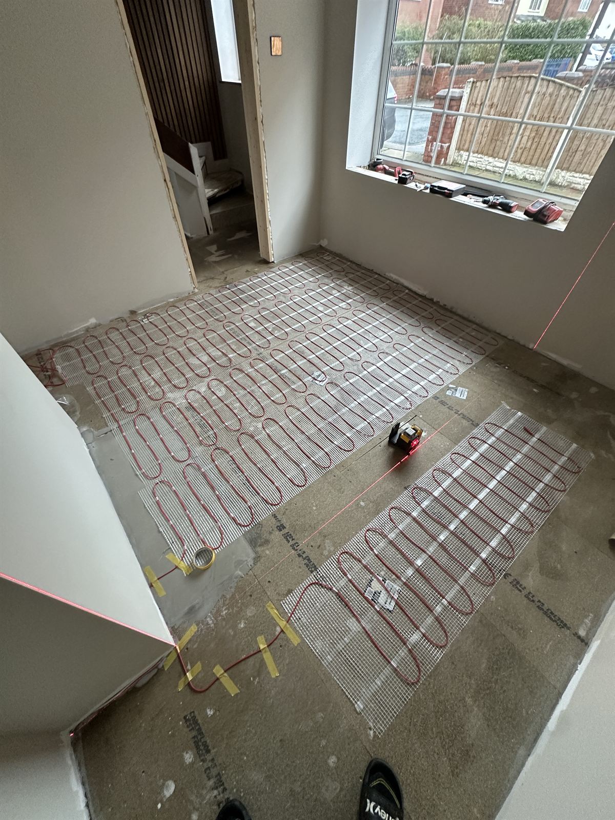 Underfloor heating loops laid out before screeding